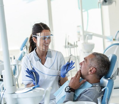 Dentist explaining treatment to patient